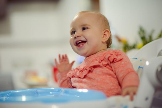 Portrait of adorable baby girl. Childhood. Authentic image