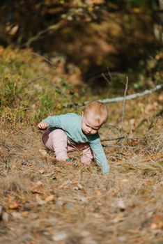 Adorable girl having fun on beautiful autumn day. authentic childhood image