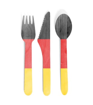 Eco friendly wooden cutlery - Plastic free concept - Isolated - Flag of Germany