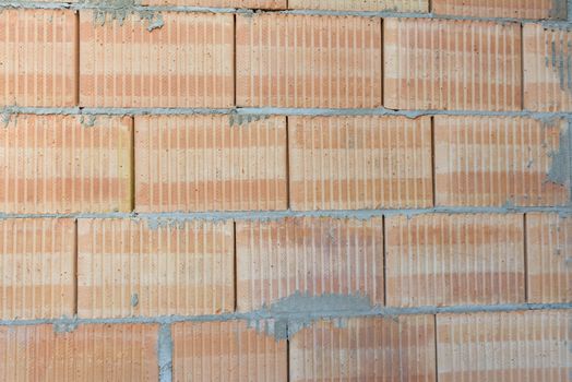 Interior of a Unfinished Red Brick House Walls under Construction without Roofing.