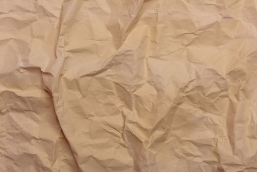 Brown Crumpled creased paper background vintage style.