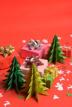 Christmas or New Year background, plain composition made of Xmas decorations and fir branches, flat lay, blank space for a greeting text.