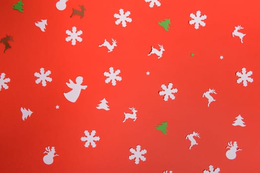 Christmas or New Year background, plain composition made of Xmas decorations and fir branches, flat lay, blank space for a greeting text.