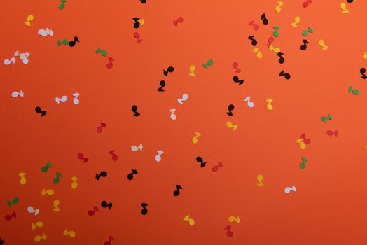 Paper colorful music notes background. View above.