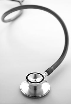 stethoscope on white background close-up and a place for your text