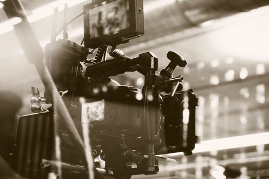 Film industry. Filming with professional camera background