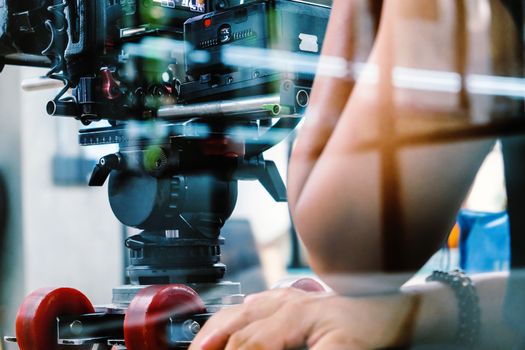 Film industry. Filming with professional camera background