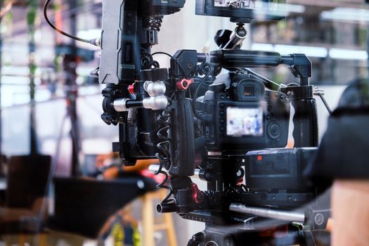 Film industry. Filming with professional camera background