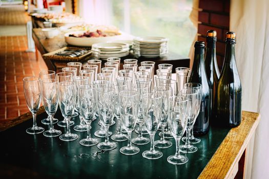 toasting many glasses for anniversaries empty goblets chalices before the toast at the restaurant to celebrate anniversary .