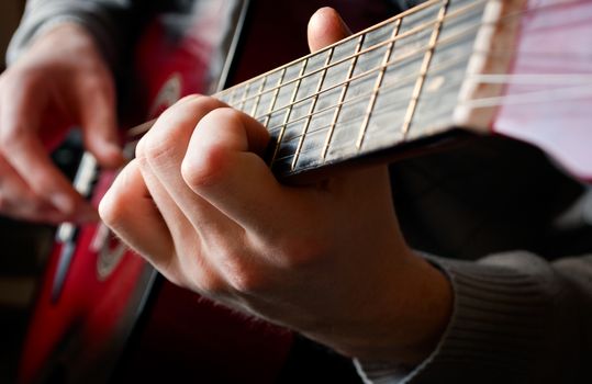 man playing a guitar