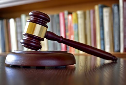 Close-up of a vintage gavel, on blurred background, symbol of impartiality and rightness, judicial decisions, closed cases and justice