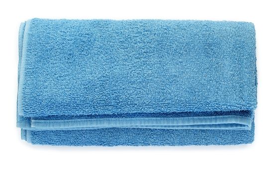 blue bathing towel on a white background, rolled in a roll
