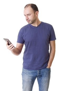 young casual man with a phone, isolated