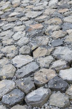 Outer slope coating of basalt rocks in a sea defense in the north of the Netherlands 
