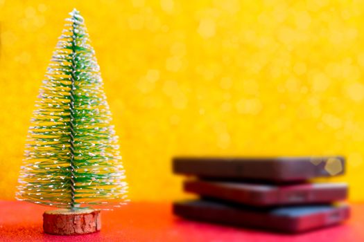 Festive Christmas tree and computer hard drives for data storage.