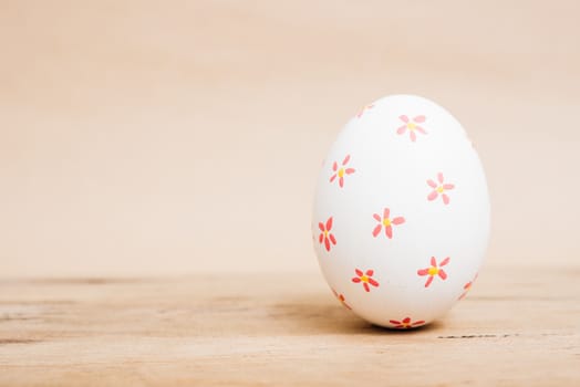 Beautiful Easter White egg on wooden background, Easter day concept