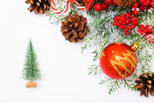 Christmas composition decorations, fir tree branches on white background. Merry Christmas concept. Copy space for text