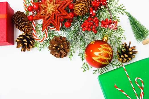 Christmas composition decorations, fir tree branches on white background. Merry Christmas concept. Copy space for text