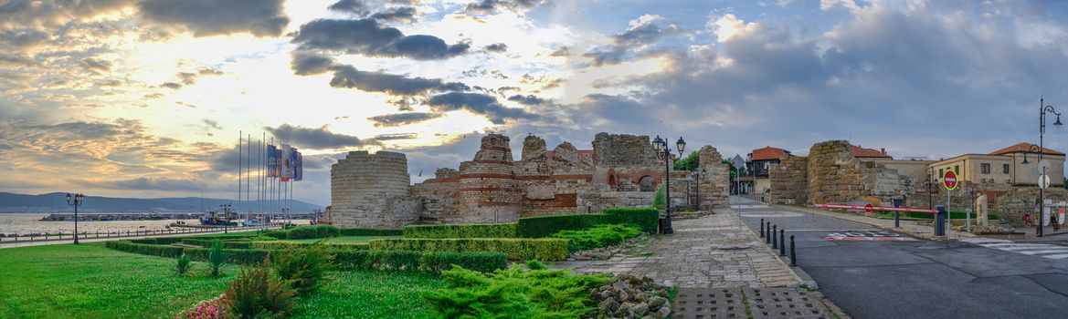 Nessebar, Bulgaria – 07.10.2019.  The ruins of the fortress wall and tower of the old town of Nessebar in Bulgaria on a summer morning