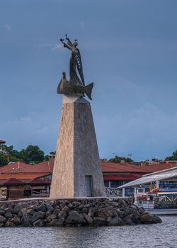 Nessebar, Bulgaria – 07.10.2019.  Monument to St Nicholas in front of the main entrance to the old town of Nessebar, Bulgaria on a sunny summer morning