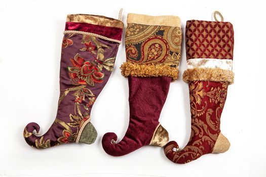 Three christmas sock on a white isolated background