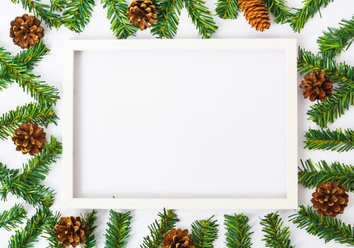 Happy New Year and Christmas day, top view flat lay composition decoration and photo frame on white background with copy space for your text