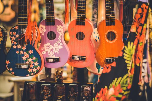 The Ukelele is a member of the lute family of instruments. It generally employs four nylon or gut strings or four courses of strings. Some strings may be paired in courses, giving the instrument a total of six or eight strings.