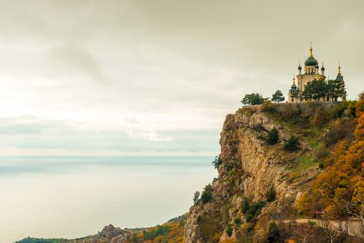 The rock, the sea and the beautiful Church of the Resurrection of Christ in Foros in the Crimea, Russia