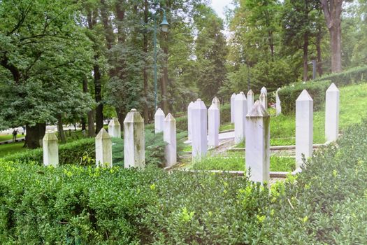 Muslim war graves in a garden in Sarajevo by day, Bosnia-Herzegovina