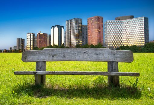 a Old wooden bench with skyline 