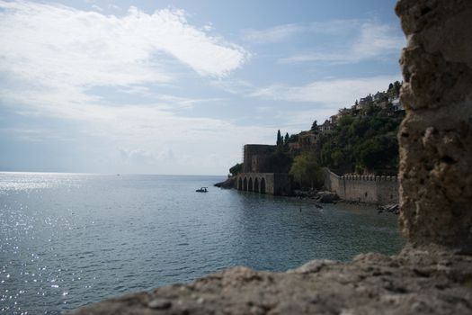 Landscape of ancient shipyard near of Kizil Kule tower - Alanya peninsula, Turkey