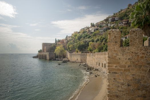 Landscape of ancient shipyard near of Kizil Kule tower - Alanya peninsula, Turkey