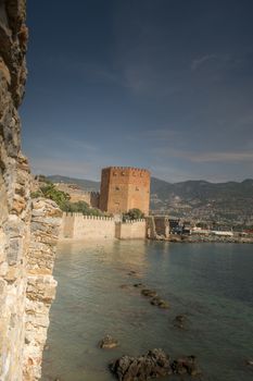 Landscape of ancient shipyard near of Kizil Kule tower - Alanya peninsula, Turkey