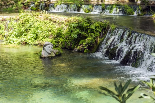 Livadeia, Greece - 26 April, 2019: The statue of Nymph Erkyna in the river with the same name