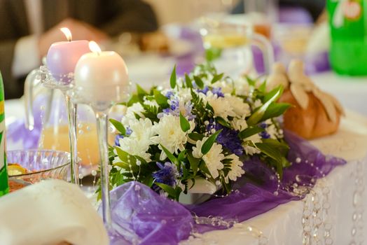 Beautifully decorated wedding table and other details at wedding hall. Wedding day