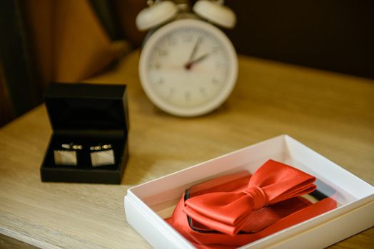 Groom's wedding accessories. Bow tie, suit, cufflinks, belt and shoes