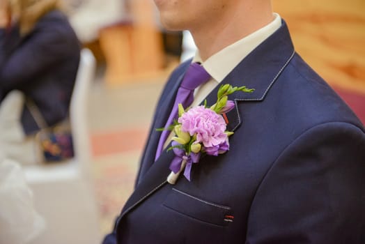 Bride and groom at church wedding during ceremony. Beautiful decoration