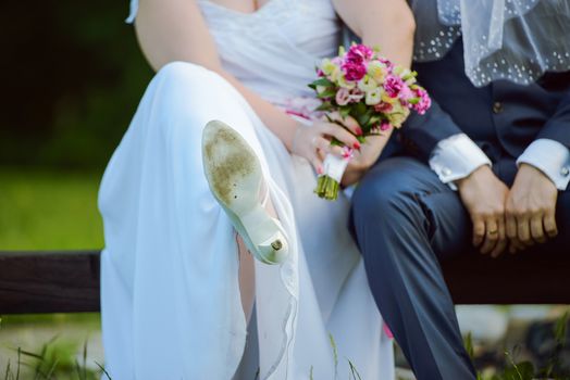 Bride and groom at a photo session in the nature.