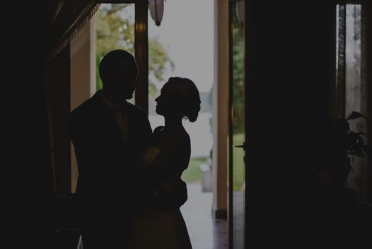 Bride and groom at a photo session in the nature.