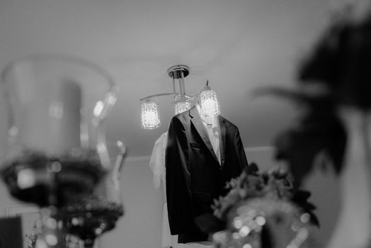Groom's wedding accessories. Bow tie, suit, cufflinks, belt and shoes