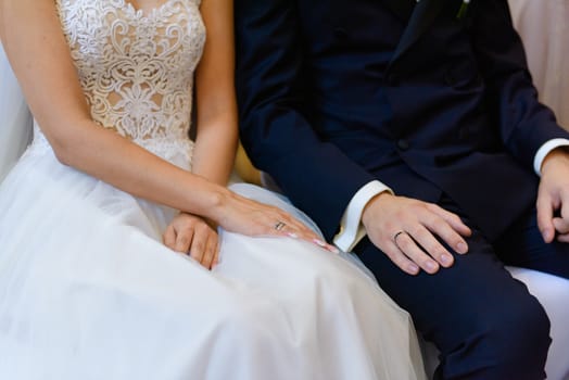 Bride and groom at church wedding during ceremony. Beautiful decoration