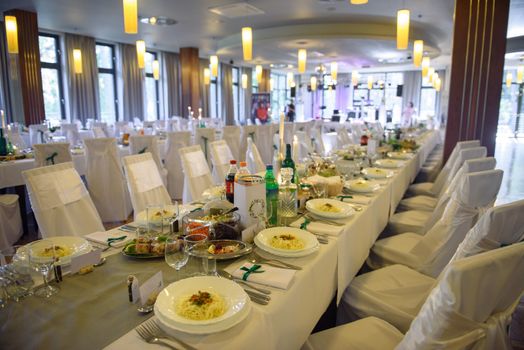 The elegant dinner table. Wedding table setting