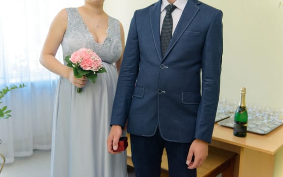 Bride and groom at church wedding during ceremony. Beautiful decoration
