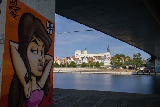 Cityscape with Odra river. Szczecin historical city with architectural layout similar to Paris. Castle of Pomeranian dukes in Szczecin and Basilica of Saint James