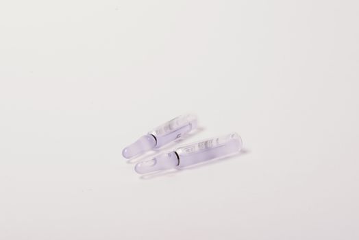 Medical ampules for injections on a white background