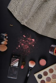 close up of a make up powder and a brush. makeup brush with powder foundation