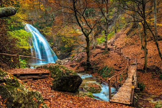 Autumn landscape, beautiful sights Jur-Jur waterfall in the mountains