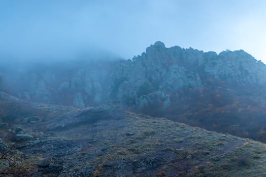 Blue fog, mountain landscape in the high mountains on an autumn afternoon