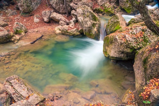 Delightful landscape - flowing water, large stones in the mountains