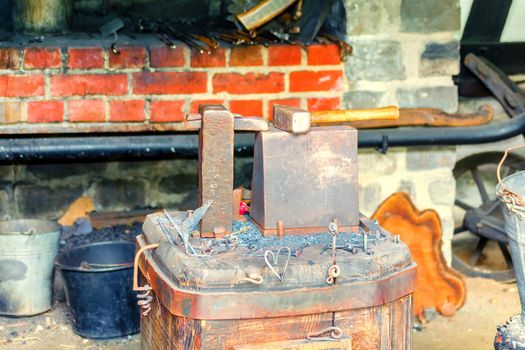 View into an old workshop. Old blacksmith iron foundry